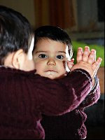 Boy looking in mirror